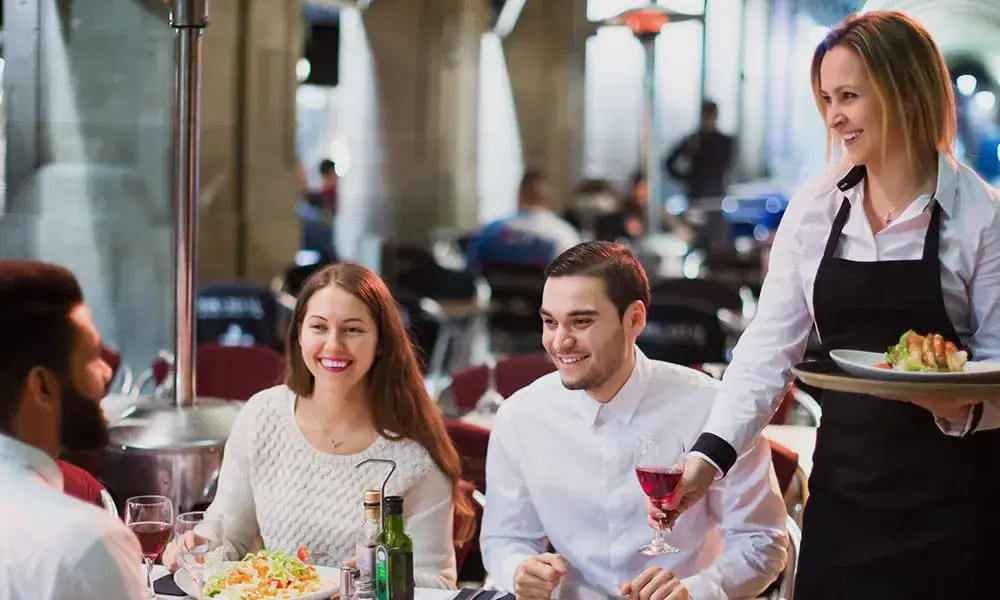 Image showing cybersecurity solutions for the hospitality industry with icons of hotel services and digital devices.